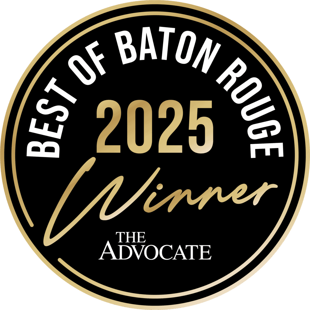 Round black and gold badge that says "Best of Baton Rouge 2025 Winner, Primary Care, The Advocate.