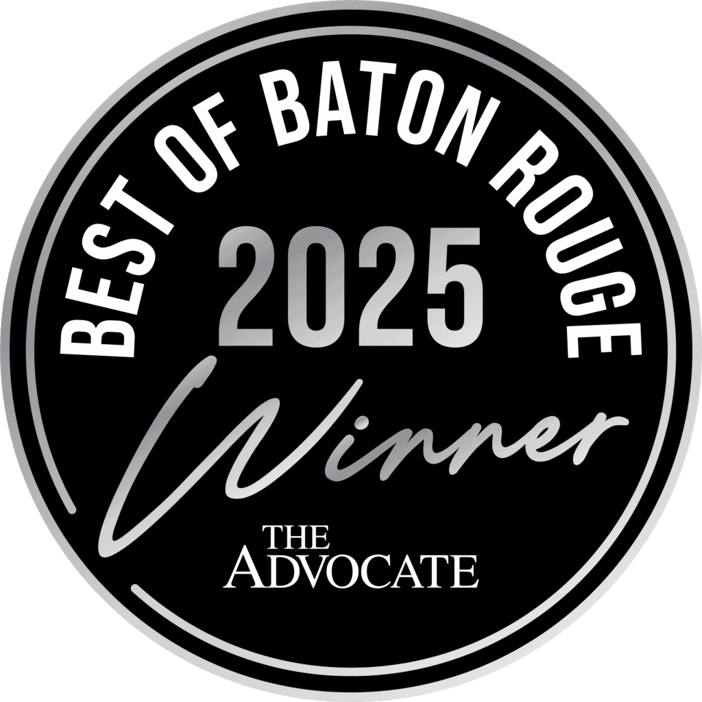 Black circular badge reading "Best of Baton Rouge 2025 Winner, Primary Care, The Advocate" in white and gray text.