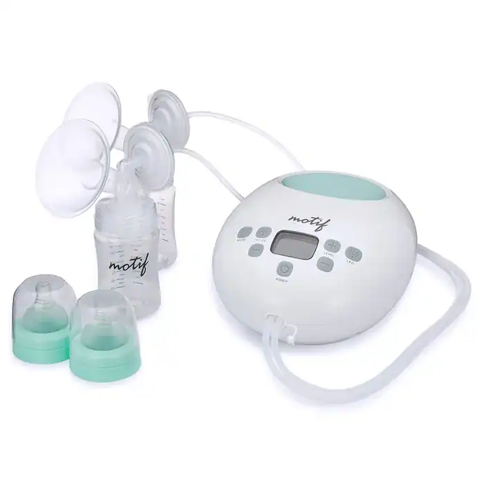 A double electric breast pump with milk bottles, flanges, tubing, and extra bottle lids on a white background.