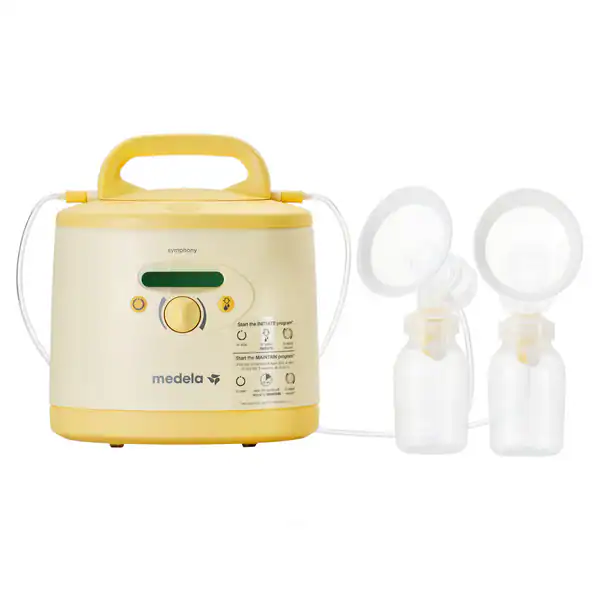 A yellow and white Medela electric breast pump with two bottles and breast shields attached by tubing.